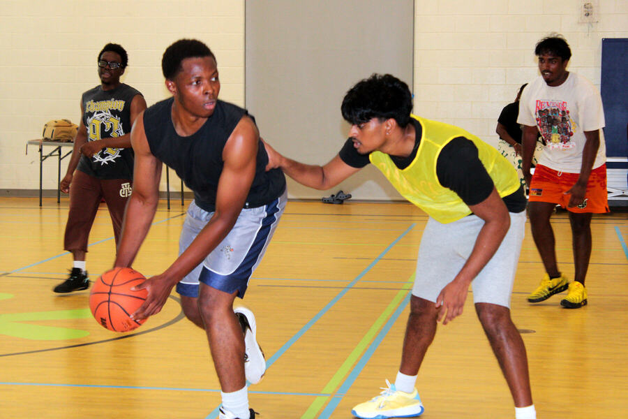 A player driving past his defender