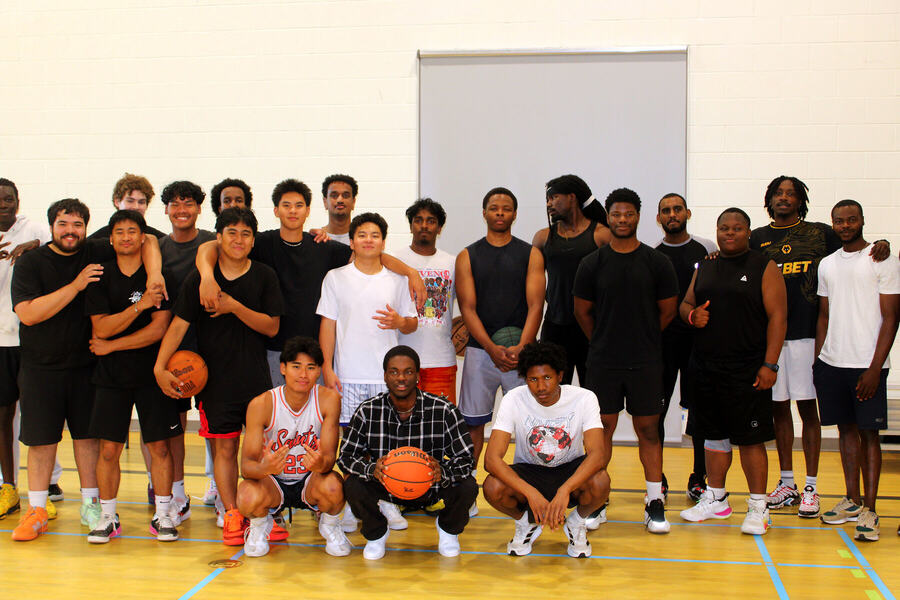 Everyone who came to the soft launch, together on the court