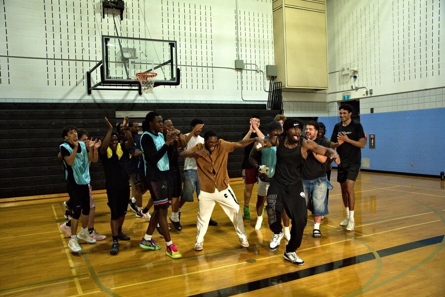 Everyone celebrating together on court after the launch run